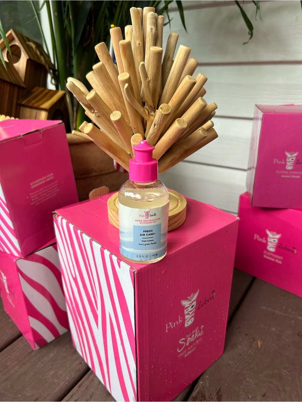 Pink Zebra Wood Tree diffuser with Fresh Air Care oil.